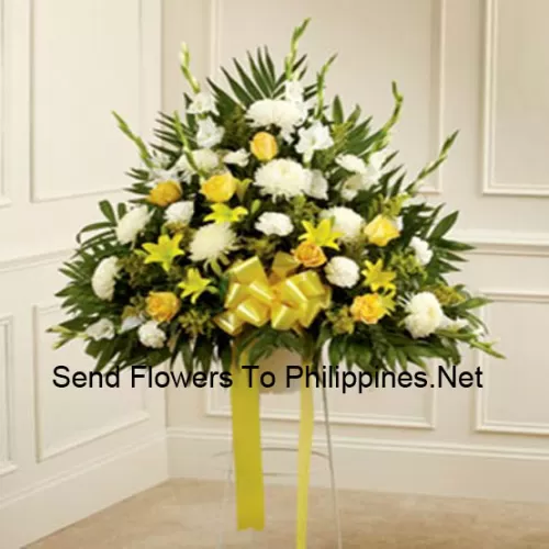 Um belo arranjo de flores de simpatia que vem com um suporte (entrega apenas na região metropolitana de Manila, para entregas fora de Manila, o produto pode ser substituído por outro arranjo de simpatia de mesmo valor)